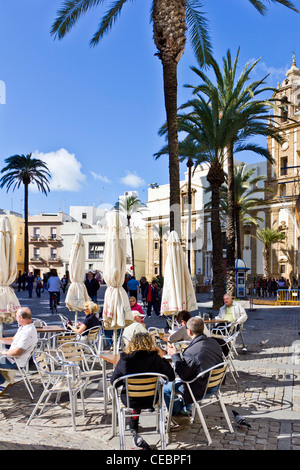 Outdoor Restaurant in Plaza de la Catedral, Cadiz Spain. Cadiz is one of the oldest continuously-inhabited cities of Europe. Stock Photo