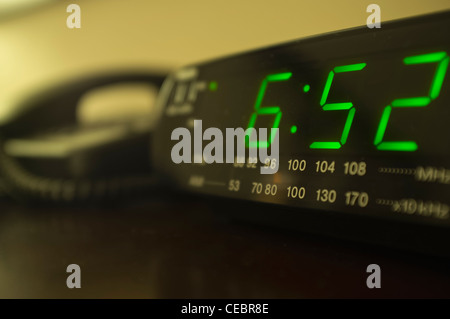 Hotel room nightstand with radio alarm clock and telephone Stock Photo