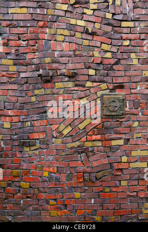 Klinker brinks of a chimney that are wildly places in an intriguing and funny way Stock Photo