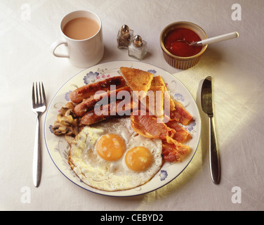 Full English breakfast with cup of tea, Berkshire, England, United Kingdom Stock Photo