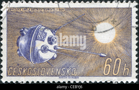 A stamp printed in the Czechoslovakia, shows Soviet artificial earth satellite and the Sun, circa 1961 Stock Photo