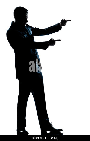 one caucasian man showing pointing empty copy space  full length silhouette in studio isolated white background Stock Photo