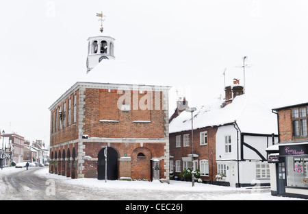 Old town Amersham 17th century market hall in Winter snow Bucks UK Stock Photo