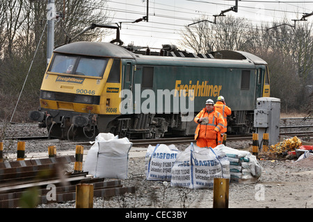 A derailed freight train blocks the West Coast Main Line near Bletchley causing widespread travel disruption Stock Photo