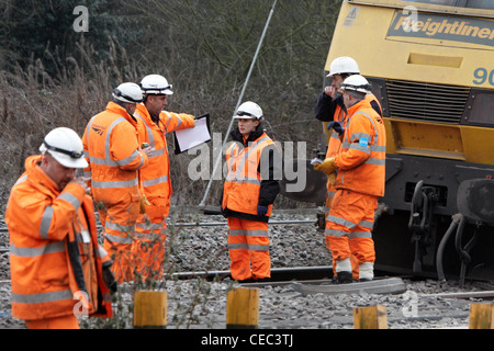 A derailed freight train blocks the West Coast Main Line near Bletchley causing widespread travel disruption Stock Photo