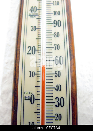 Indoor thermometer indicating very cold temperatures Stock Photo