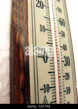 Indoor thermometer indicating very cold temperatures Stock Photo