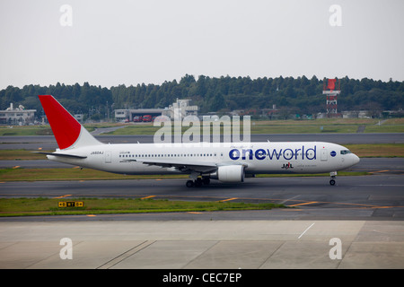 A Japan Airlines (JAL) Boeing 767-300, in One World livery, takes