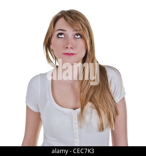 Young woman looking up with expression as she is thinking about something Stock Photo