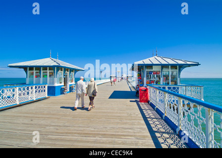 llandudno wales tourists walking down Llandudno pier llandudno wales North Wales North Sea UK GB Europe Stock Photo