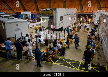 People wait their turn for free eye care in Inglewood, CA. Many patients waited in line all night for admission. Stock Photo