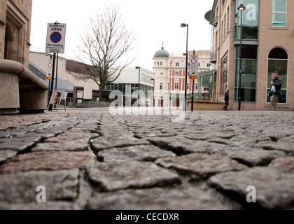 View from the cobble stones of Norfolk Row towards the Crucible in Sheffield City Centre, South Yorkshire UK Stock Photo