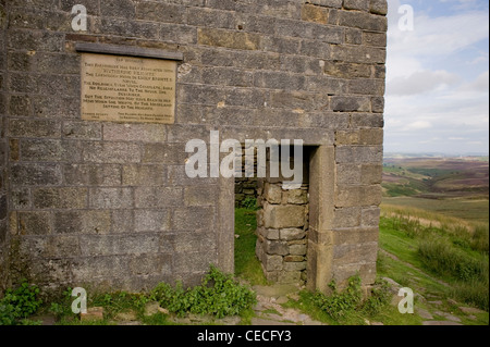 Top Withens (plaque on wall) crumbling farmhouse ruin on wild remote Pennine moors (Wuthering Heights?) - near Haworth, West Yorkshire, England, UK. Stock Photo