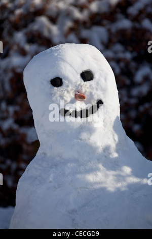 Snowman with smiley face Stock Photo