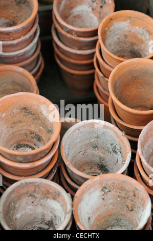 Stacked terracotta flowerpots Stock Photo