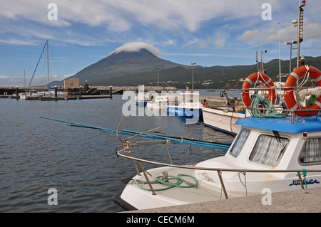 EUROPE, PORTUGAL, AZORES, Pico, Lajes do Pico, harbour with Mt Pico (highest mountain in Portugal) in the background Stock Photo