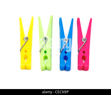 Colourful clothes pegs on a white background Stock Photo