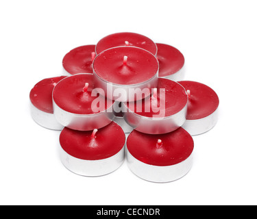 Red tea lights candles on white background Stock Photo
