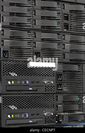 servers stack with hard drives in a datacenter for backup and data storage Stock Photo