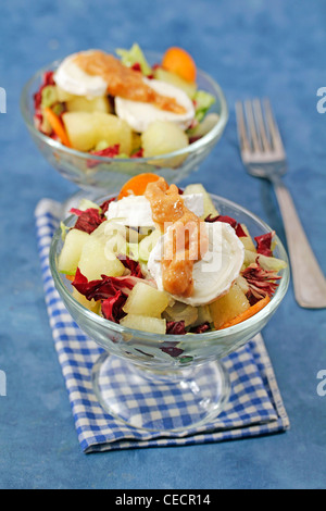 Chicory and melon salad with cheese and quince. Recipe available Stock Photo