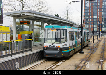 Metrolink tram approaches media city salford with service to Manchester Piccadilly Stock Photo