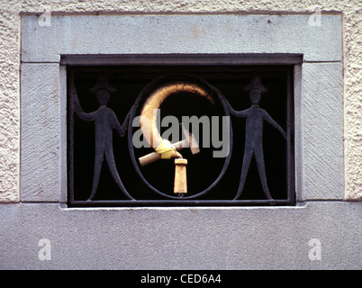 Wrought iron grate with the communist symbol hammer and sickle in Kreis 1 district or Altstadt old town  Zurich Switzerland Stock Photo