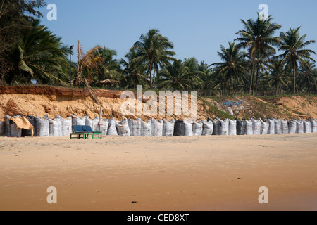 Coastal erosion at Sinquerim, Goa, India. Stock Photo