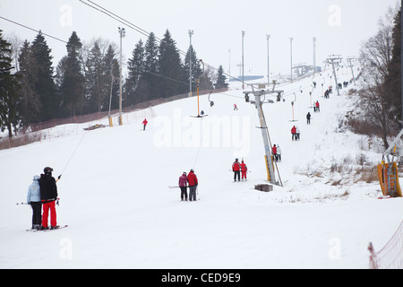 Russian ski resorts Sorochany in winter season with resting people in ...