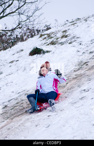 A girl coming down a hill in Cambridgeshire, England. 2012 Stock Photo