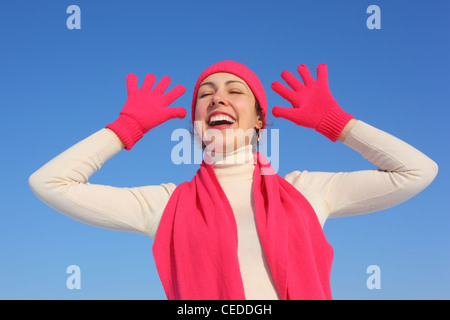 Young woman in red gloves Stock Photo