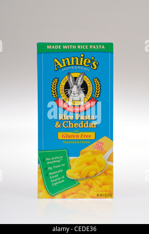 Box of Annie's Homegrown gluten-free natural macaroni and cheddar cheese rice pasta on white background, cutout. USA. Stock Photo