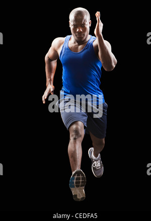 African American athlete training for long jump Stock Photo