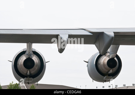 Massive jet engines mounted on wing of United States Air Force C-17 Globemaster cargo aircraft. Stock Photo