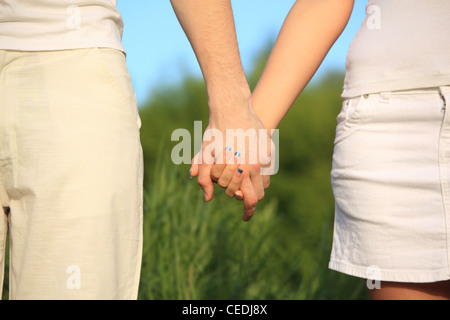 man's and female's hands to be held for each other Stock Photo
