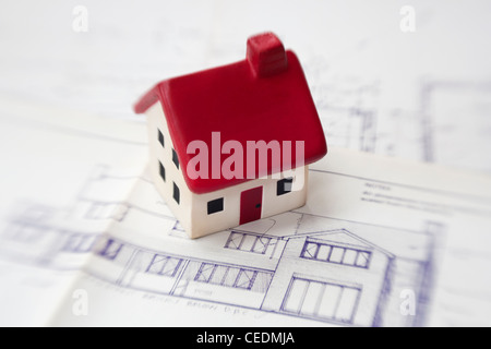 House with building plans Stock Photo