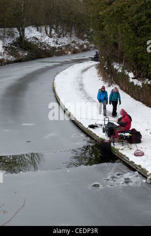 Fishermen fishing in the Coventry canal, Nuneaton, Warwickshire, after ...