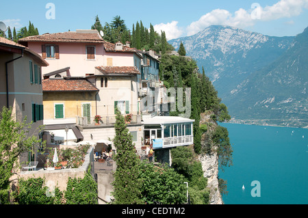 Italy, Lombardy, Lake Garda, Pieve di Tremosine, houses perched on cliffs overlooking lake Stock Photo