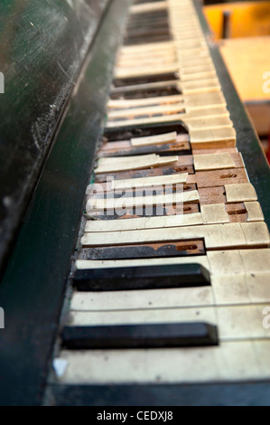 Broken down piano Stock Photo