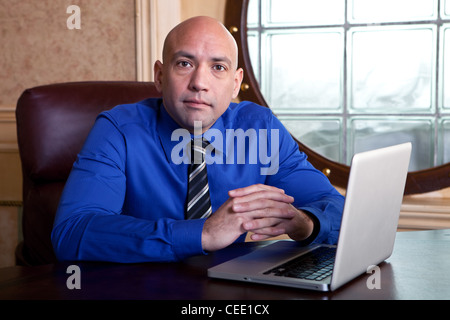 businessman working on a laptop Stock Photo