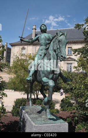 An equestrian statue of Joan of Arc on Place Cardinal-Luçon, close to Cathedrale Notre Dame in Reims, Champagne-Ardenne, France. Stock Photo