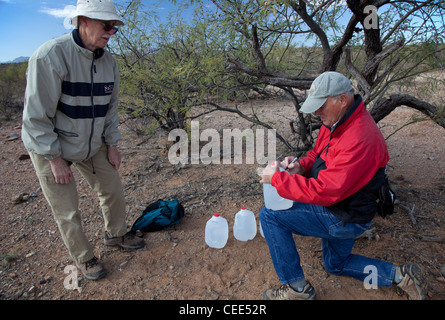 Volunteers Leave Food and Water in Arizona Desert to Prevent Deaths of Migrants Crossing Border Stock Photo