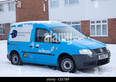 A British Gas Centrica energy supplier engineers van parked outside a residential house in the snow Nottingham England UK Stock Photo