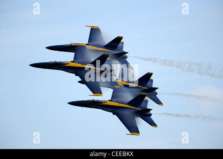 The U.S. Navy flight demonstration squadron, the Blue Angels, perform a Diamond 360 at the Rhode Island National Guard Open House Air Show. The Blue Angels performed in Rhode Island during the 2011 show season and in celebration of the Centennial of Naval Aviation. Stock Photo