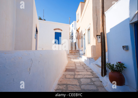 Narrow alley in the village of Isternia, on the Greek Cyclade island of Tinos. Stock Photo