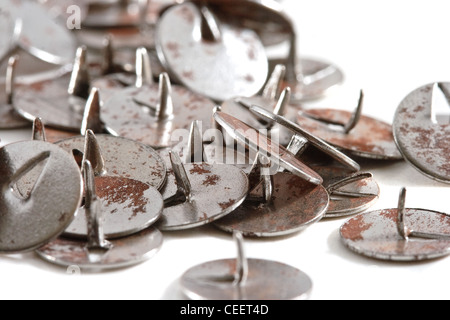 Old rusty push-pins Stock Photo