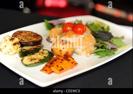 Grilled fish, vegetables and salad Stock Photo