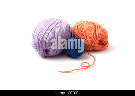 Balls of a multi-coloured yarn on white background Stock Photo