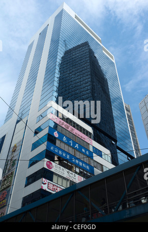 dh  CAUSEWAY BAY HONG KONG New multi storey highrise building with new construction reflection