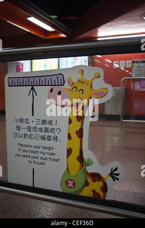 dh Mass transit railway MTR HONG KONG Train fare height measure for childrens fares child kids measuring Stock Photo