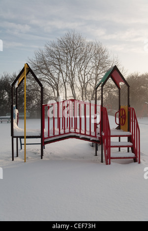 Children's playground covered with snow in winter Stock Photo - Alamy